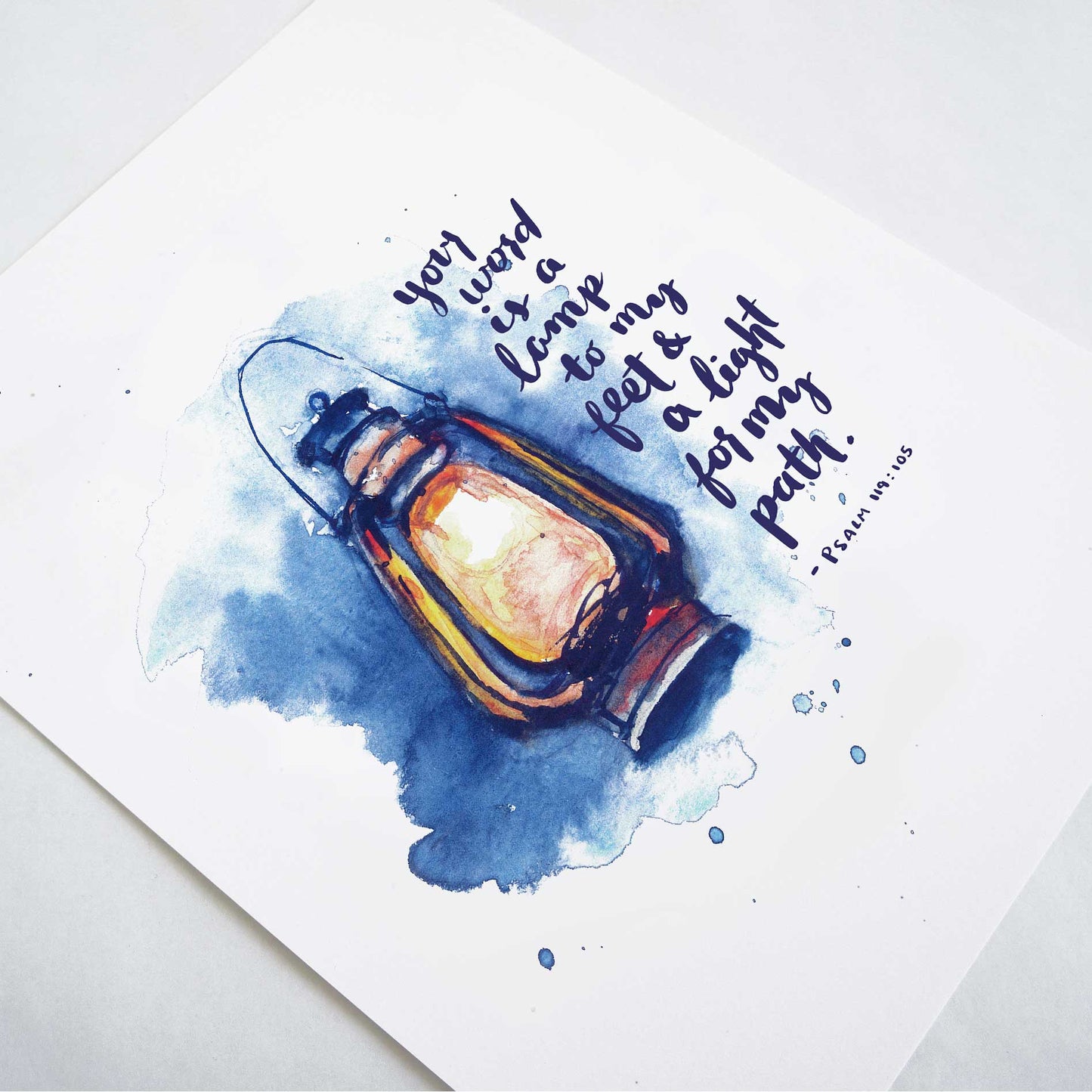 Angle shot of Psalm 119:105 Lamp to my Feet Bible Art Print